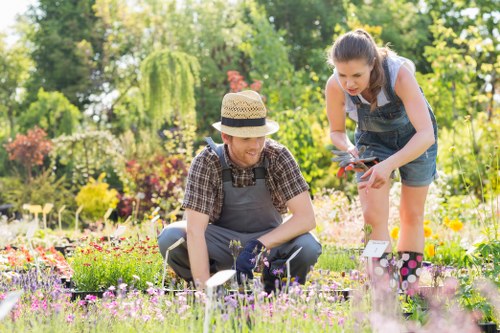 Team briefing and insurance documentation for a gardening company in Hornsey